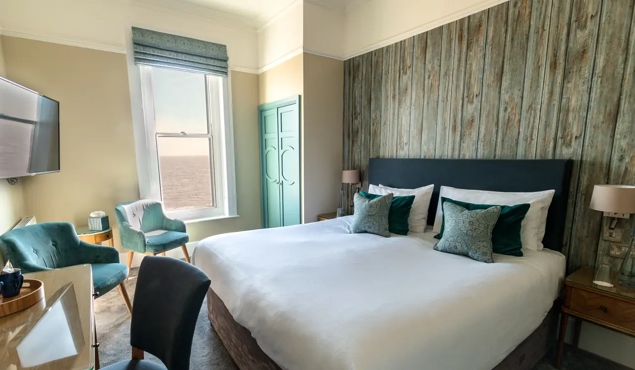 Double Seaview Bedroom bed and window at The Brudenell Hotel, Aldeburgh - room 305