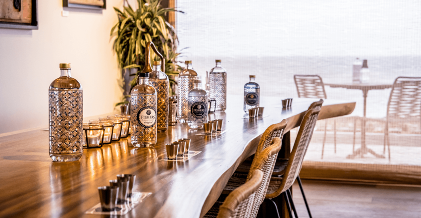 Fishers Distillery interior with gin bottles lined up