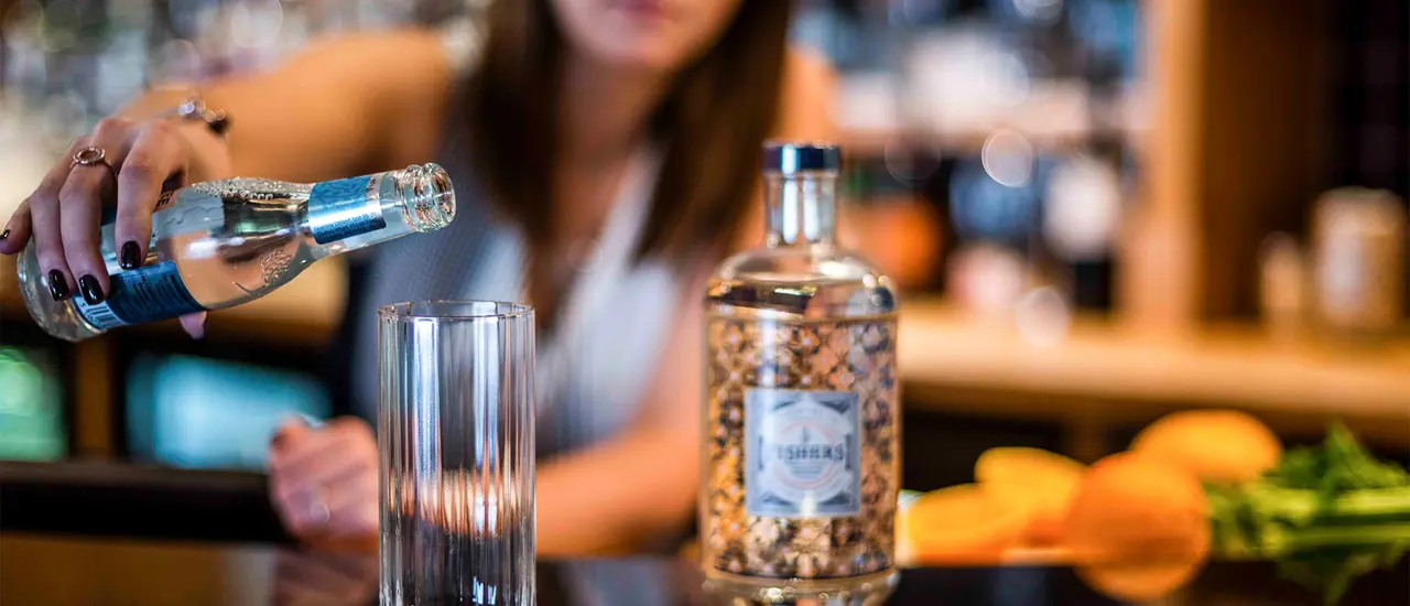 Fishers Gin and Fever Tree Tonic being poured at The Brudenell Hotel Bar, Aldeburgh