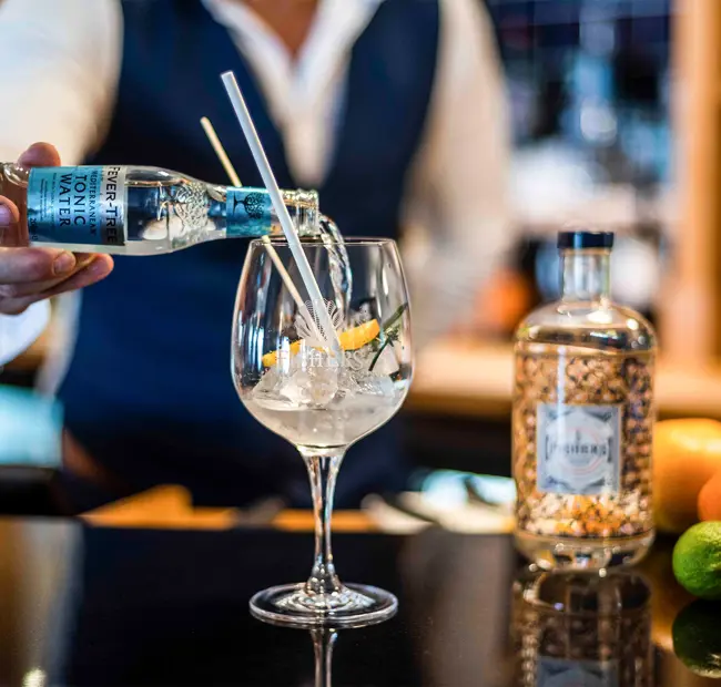 Fishers Gin and Fever Tree Tonic being poured at The Brudenell Hotel, Aldeburgh
