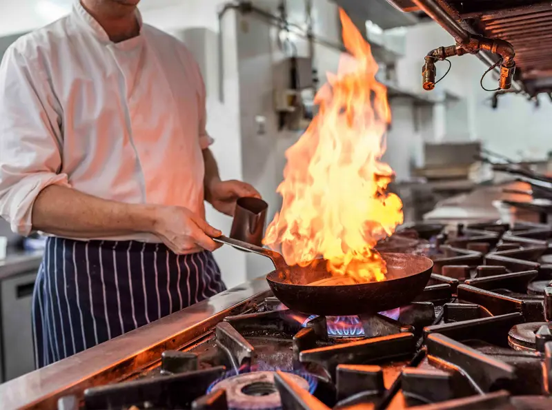 Brudenell Hotel - Seafood & Grill - action shot with folk - razor clams - whole blanched almonds, air dried garlic, samphire