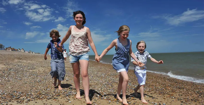 The Brudenell Hotel, Aldeburgh, Family running along Aldeburgh beach