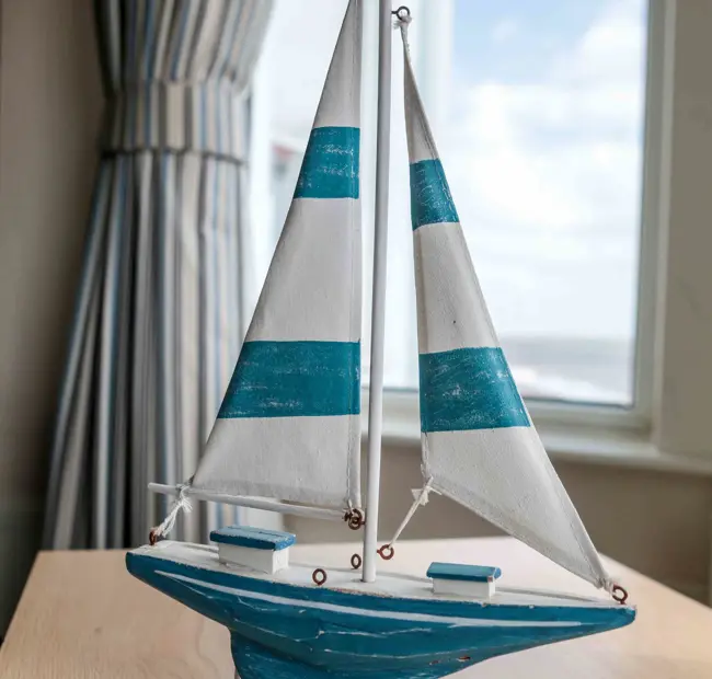 Boat sculpture in front of bay window at The Brudenell Hotel, Aldeburgh