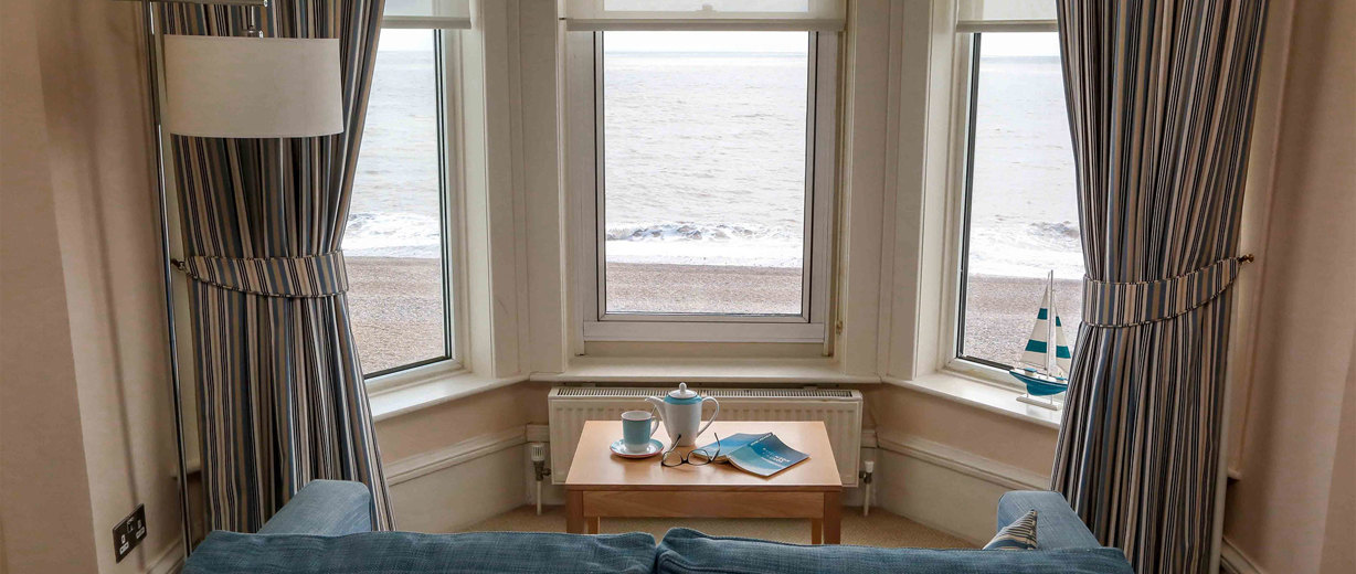 The Brudenell Hotel, Aldeburgh, deluxe seaview bedroom, sofa looking