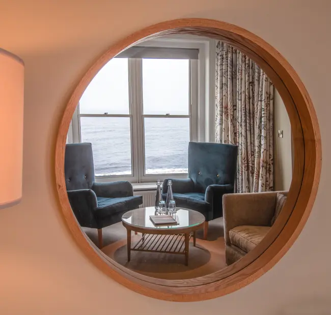 The Brudenell Hotel, Aldeburgh, Deluxe Seaview room, mirror image showing seating and seaview