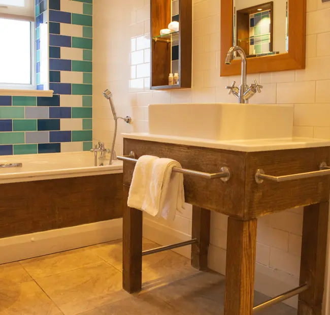The Brudenell Hotel, Aldeburgh, Deluxe Seaview room, bathroom showing sink and bath
