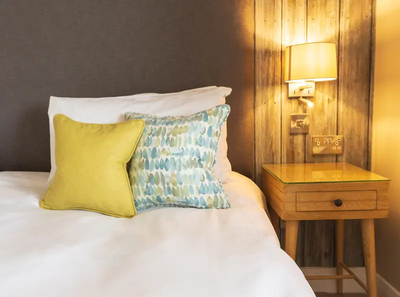 The Brudenell Hotel, Aldeburgh, Deluxe Seaview room, detail of pillows and bed side table