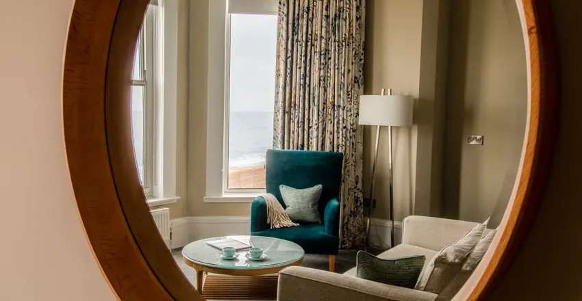 Brudenell Superior Deluxe Sea View Room, mirror shot showing sea view and seating area